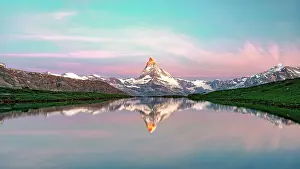 International Landmark Prints: Sunrise over Matterhorn reflected in Stellisee idyllic mountain lake