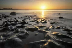 Images Dated 2nd August 2022: Sunrise from Monmouth Beach, Lyme Regis, Jurassic Coast World Heritage Site, Dorset, England, UK