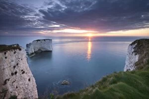 Images Dated 12th April 2012: Sunrise over Old Harry Rocks, Jurassic Coast, Dorset, England. Spring