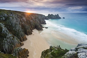 Logan Rock Prints: Sunrise over Pednvounder Beach at the Logan Rock, Cornwall, England