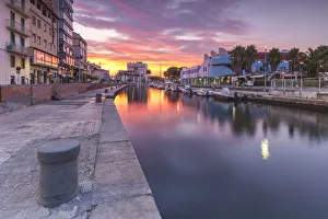 Sunrise on pier and Canale Burlamacca, Viareggio, Lucca province, Versilia, Tuscany
