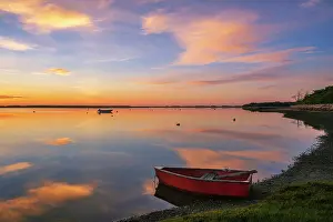 Cape Cod Prints: Sunrise over red rowboat at a marsh on Cape Cod, Massachusetts, USA