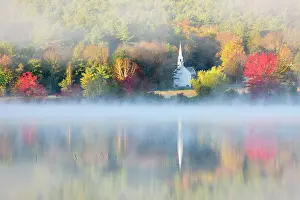 Autumn Leaf Prints: Sunrise reflection on Crystal Lake with fog and white chapel
