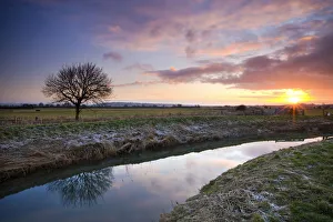 Sunrise over the River Brue on the Somerset Levels, Glastonbury, Somerset, England