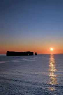 Perce Prints: SUnrise and Rocher perce (Perce Rock) on the Atlantic Ocean Perce Quebec, Canada