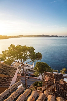 South Prints: Sunrise over the rooftops of Cala Fornells, Mallorca, Balearic Islands, Spain