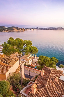 South Prints: Sunrise over the rooftops of Cala Fornells, Mallorca, Balearic Islands, Spain