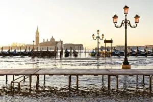 Acqua Alta Gallery: Sunrise in St Mark, view towards San Giorgio Maggiore. Venice, Veneto, Italy