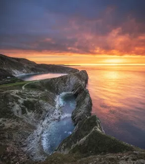 Images Dated 11th May 2021: Sunrise over Stair Hole, Lulworth, Jurassic Coast World Heritage Site, Dorset, England