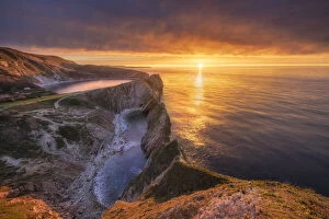 Light Collection: Sunrise over Stair Hole, Lulworth, Jurassic Coast World Heritage Site, Dorset, England