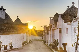Alley Prints: Sunrise between trulli houses. Unesco World Heritage Site, Alberobello, Province of Bari