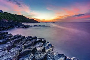 Reef Prints: Sunrise over the volcanic rock formations of Ghenh Da Dia bassalt rocks, Phu Yen, Vietnam