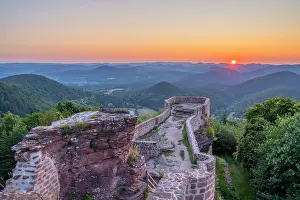 Wasgau Prints: Sunrise above Wegelnburg castle near Nothweiler