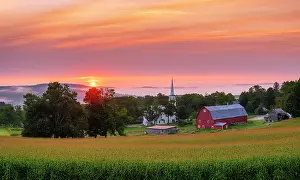 Panorama Prints: Sunrise over white-steeple church and red barn with corn field
