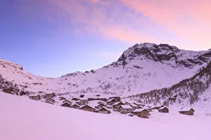 Sunset at Alpe Lendine in winter. Vallespluga, Valchiavenna, Valtellina, Lombardy