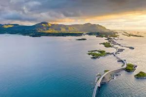 Sunset over the Atlantic Road connecting mainland and islands, aerial view