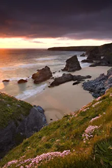 Sunset over Bedruthan Steps, North Cornwall, England. Spring (May) 2009