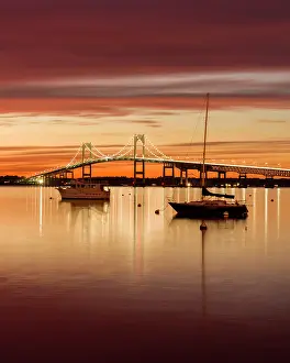 Suspension Bridge Prints: Sunset over the Clairborne Pell Bridge in Narragansett Bay with boats