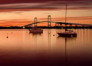 Suspension Bridge Prints: Sunset over the Clairborne Pell Bridge in Narragansett Bay with boats