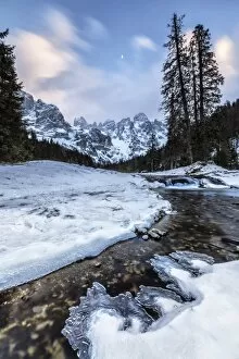 Images Dated 25th January 2016: Sunset on a frozen creek. Venagia Valley Panaveggio Natural Park Dolomites Trentino
