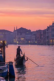 Sunset and gondolas on the Grand Canal, Venice, Veneto, Italy