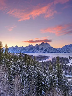 Sunset illuminating the Teton Mountain Range, Snake River Overlook, Winter Sunset Grand Teton National Park, Wyoming, USA