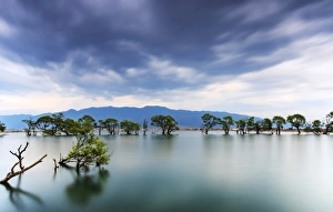 Sunset over one of the many lakes in the village of Heqing in Yunnan, China