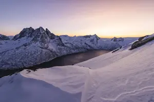 Berg Prints: Sunset lights up the snowy peak of Mount Breidtinden