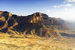 Desert Landscape Collection: Sunset lit Gheralta Mountains and Abuna Yemata Guh rock hewn church, aerial view, Hawzen