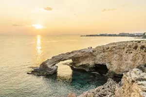 Sunset over the Love Bridge in Ayia Napa, Famagusta District, Cyprus