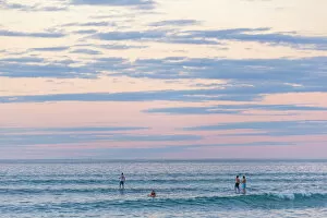 Western Australia Collection: Sunset at Ningaloo Marine Park, surfers. Western Australia