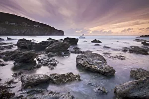 Sunset from the rocky shores of Trevaunance Cove, St Agnes, Cornwall, England. Summer
