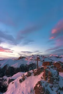 Odle Prints: Sunset over the summit cross on Gran Cir mountain covered with snow