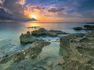 Cayman Prints: Sunset and tidal pool reflections along the ironshore of Grand Cayman