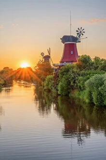 Images Dated 21st June 2023: Sunset at the Twinmills of Greetsiel, Krummhorn, East Frisia, Lower Saxony, Germany