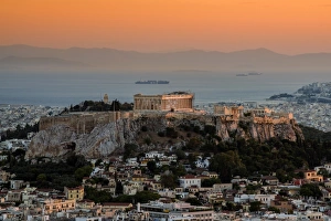 Sunset top view over Acropolis, Athens, Attica, Greece