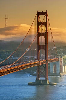 Suspension Bridge Collection: Sunset view over the Golden Gate with fog in the background, San Francisco, California