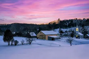 Pastoral Prints: sunset over village and white-steeple church, East Corinth, Vermont, USA