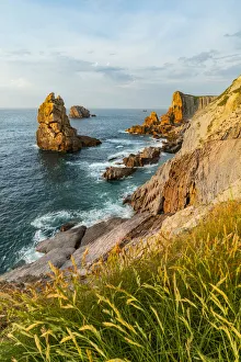Rocky Beach Prints: Sunsetscape of Playa del Portio in the Cantabrian sea