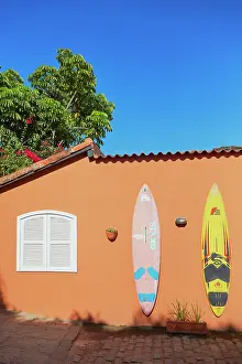 Coastal Town Prints: Surf tables on a wall of a house near the Geriba Beach, Buzios, Rio de Janeiro, Brazil