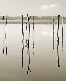 Fantasy Prints: Suspended in the air - reflected in water remains of the old jetty on the lake Azur
