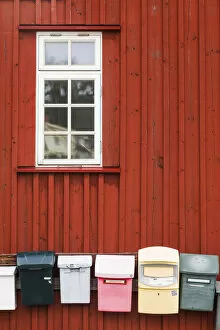 Sweden, Bohuslan, Tjarno Island, Tjarno, fishing shack and mailboxes