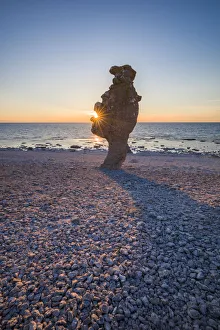 Faro Prints: Sweden, Faro Island, Langhammars Area, Langhammar coastal limestone raukar rock, sunset