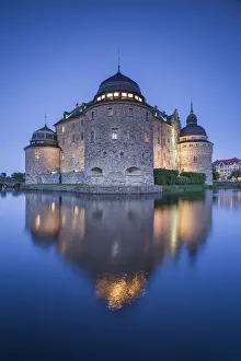 Sweden, Narke, Orebro, Orebro Slottet Castle, dusk
