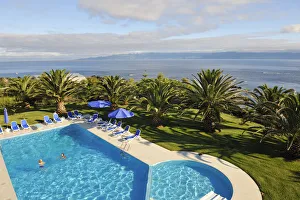 Horizons Prints: A swimming pool in a hotel of Velas, capital city of Sao Jorge. Azores islands, Portugal