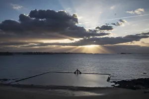 Sunbeams Prints: The swimming pool at sunset on the Plage de Bon Secours, St. Malo, Ille et Vilaine