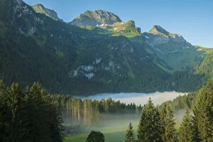 Images Dated 17th August 2021: Switzerland, St. Gallen, Grabs, Voralp, Gamsberg and fog over Voralpsee
