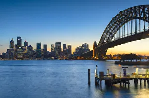 New South Wales Prints: Sydney Harbour Bridge and skyline at sunset, Sydney, New South Wales, Australia