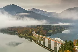 Sylvenstein Lake and bridge surrounded by the morning mist