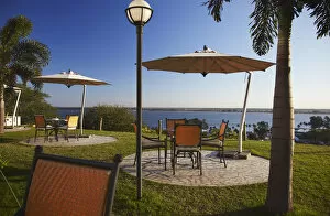 Images Dated 24th November 2010: Tables and chairs in grounds of Hotel Cardoso, Maputo, Mozambique